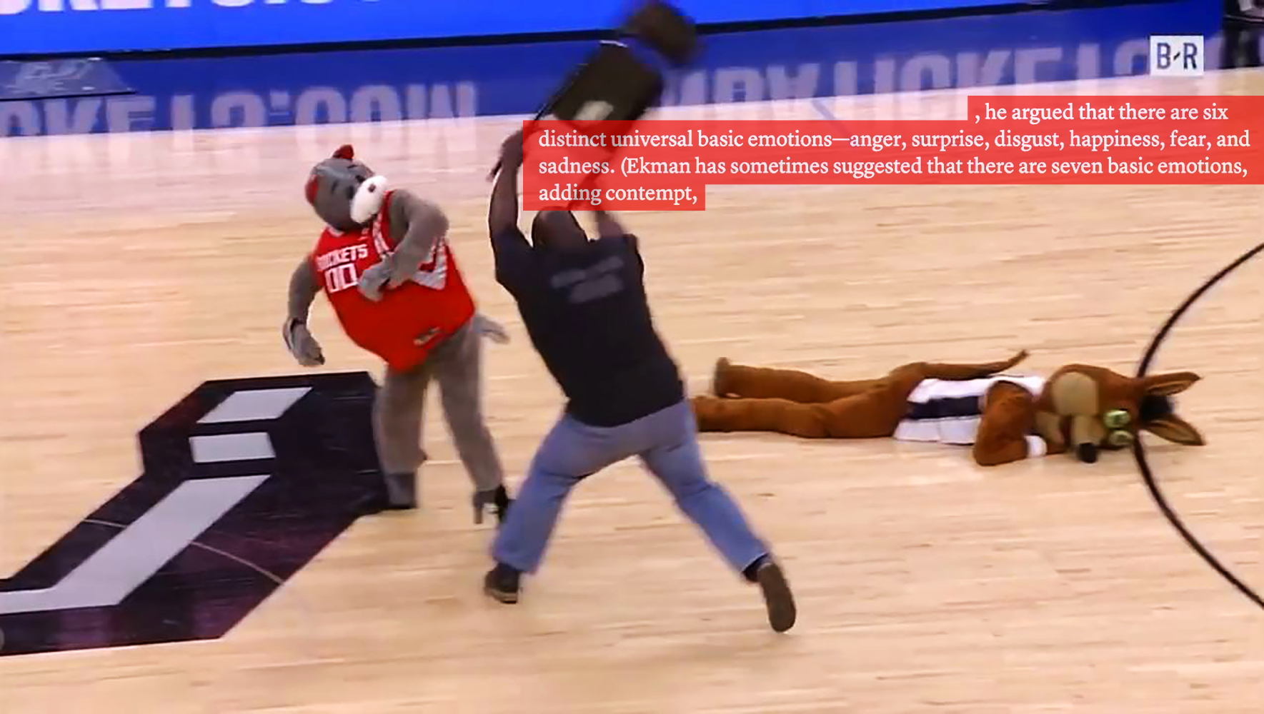 a man swings a folding chair at a cowering sports mascot on a basketball court. behind them, another mascot lays on the ground. text reads: ', he argued that there are six distinct universal basic emotions - anger, surprise, disgust, happiness, fear, and sadness. (Ekman has sometimes suggested that there are seven basic emotions, adding contempt,'